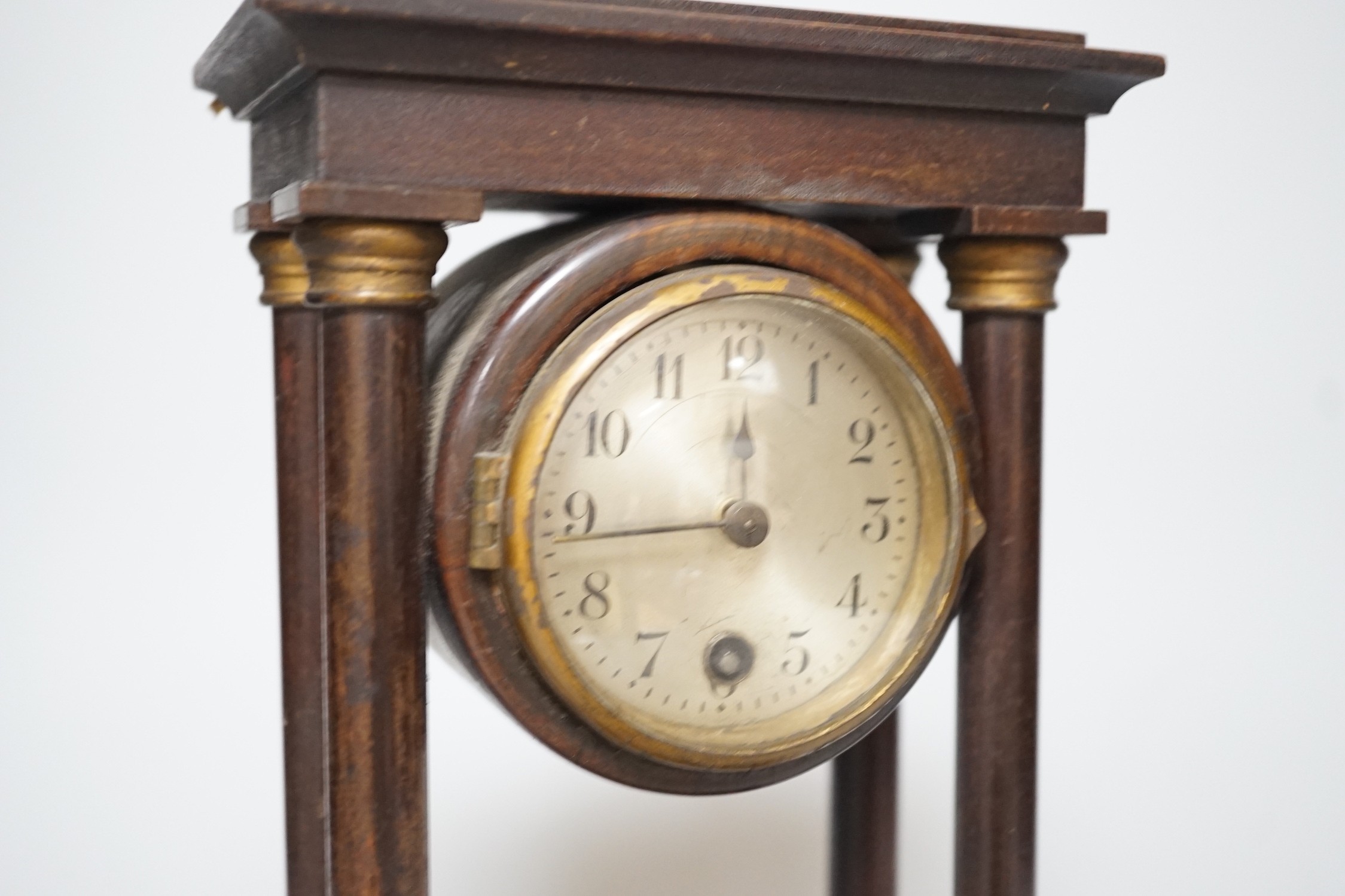 An Edwardian Portico-type mantel clock, 27cms high